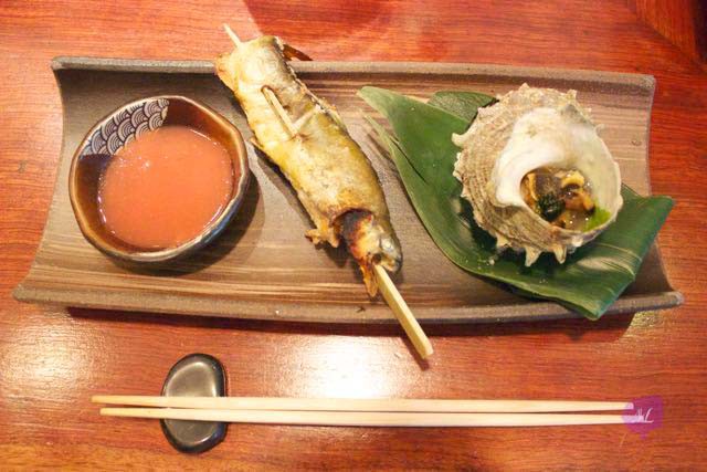 Grilled Japanese conch and grilled smelt