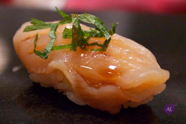 Orange clam with shiso leave