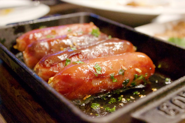 Tetsunabe kurobuta sausage 8 – oven roasted on iron skillet, garlic, sake