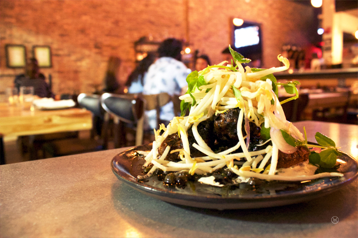 Veal brains meuniere $15- black butter, capers, blue crab tartar, bean sprouts