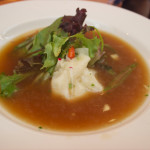 Lobster dumpling soup with coconut fennel creme and watercress