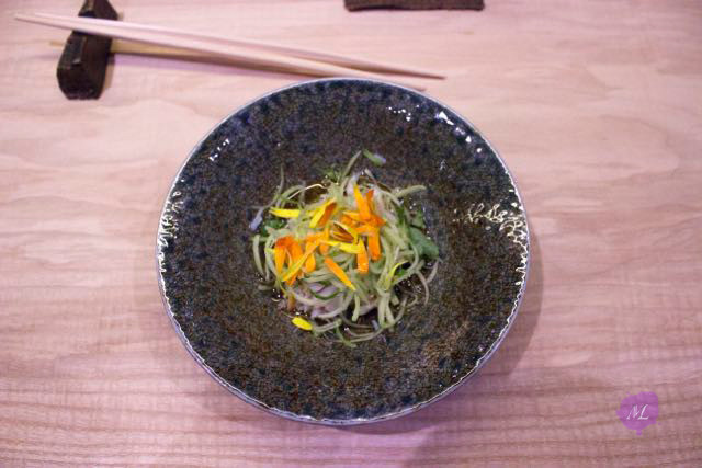 West coast dungeness crab cucumber salad and sunflower in Yuzu soba sauce